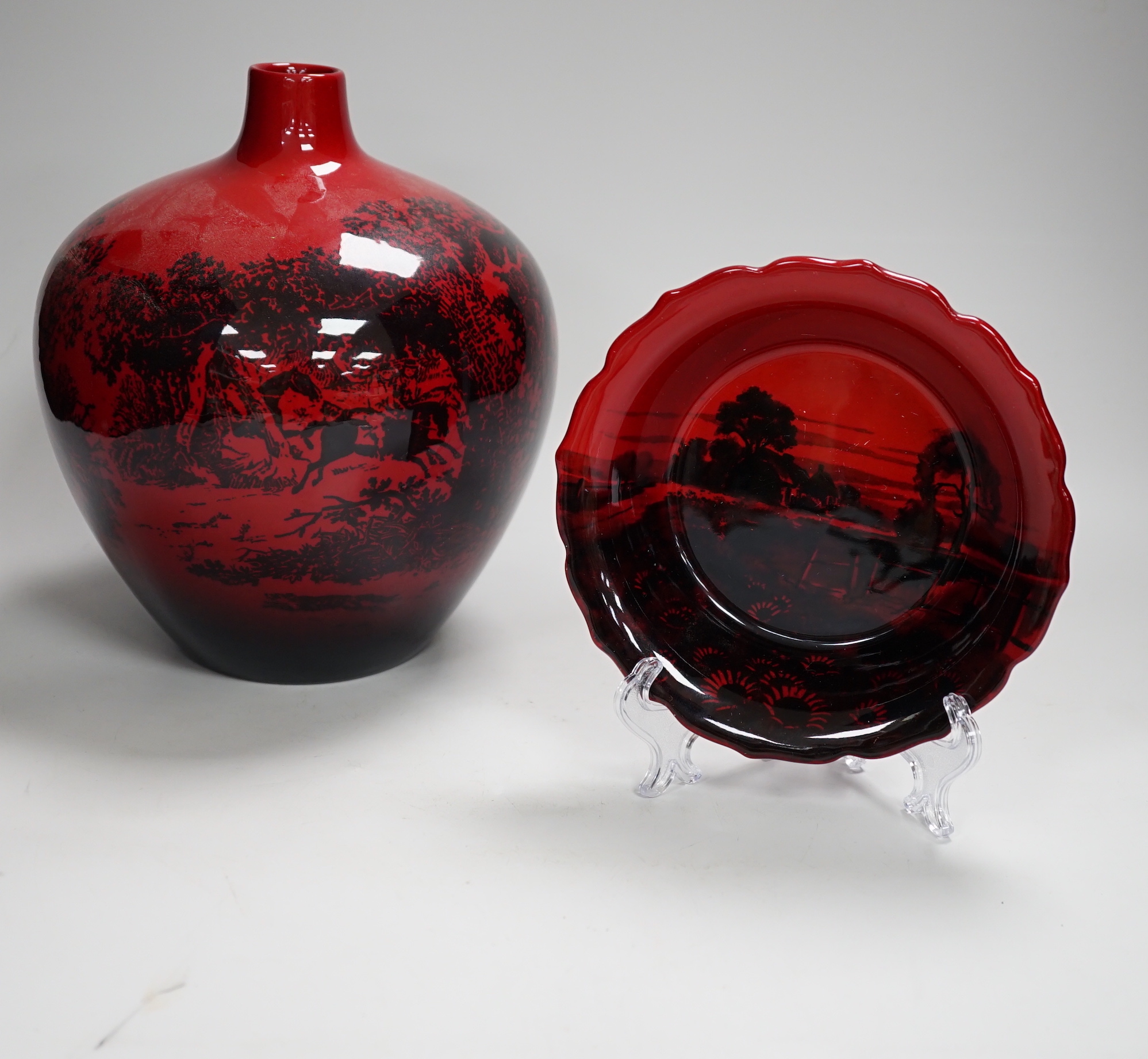 A Royal Doulton Flambé vase and bowl, the largest 22cm high